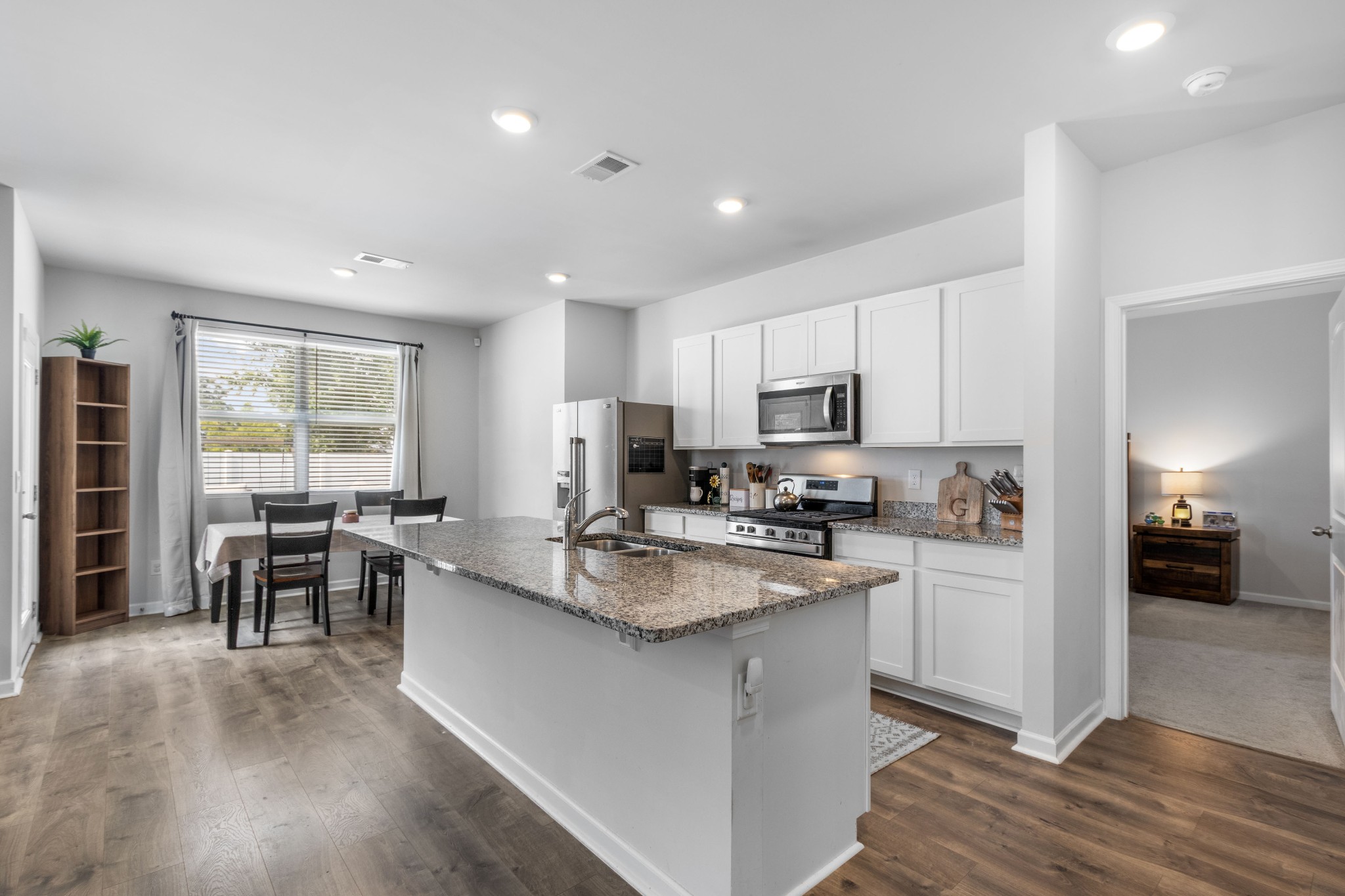 White kitchen with large center island