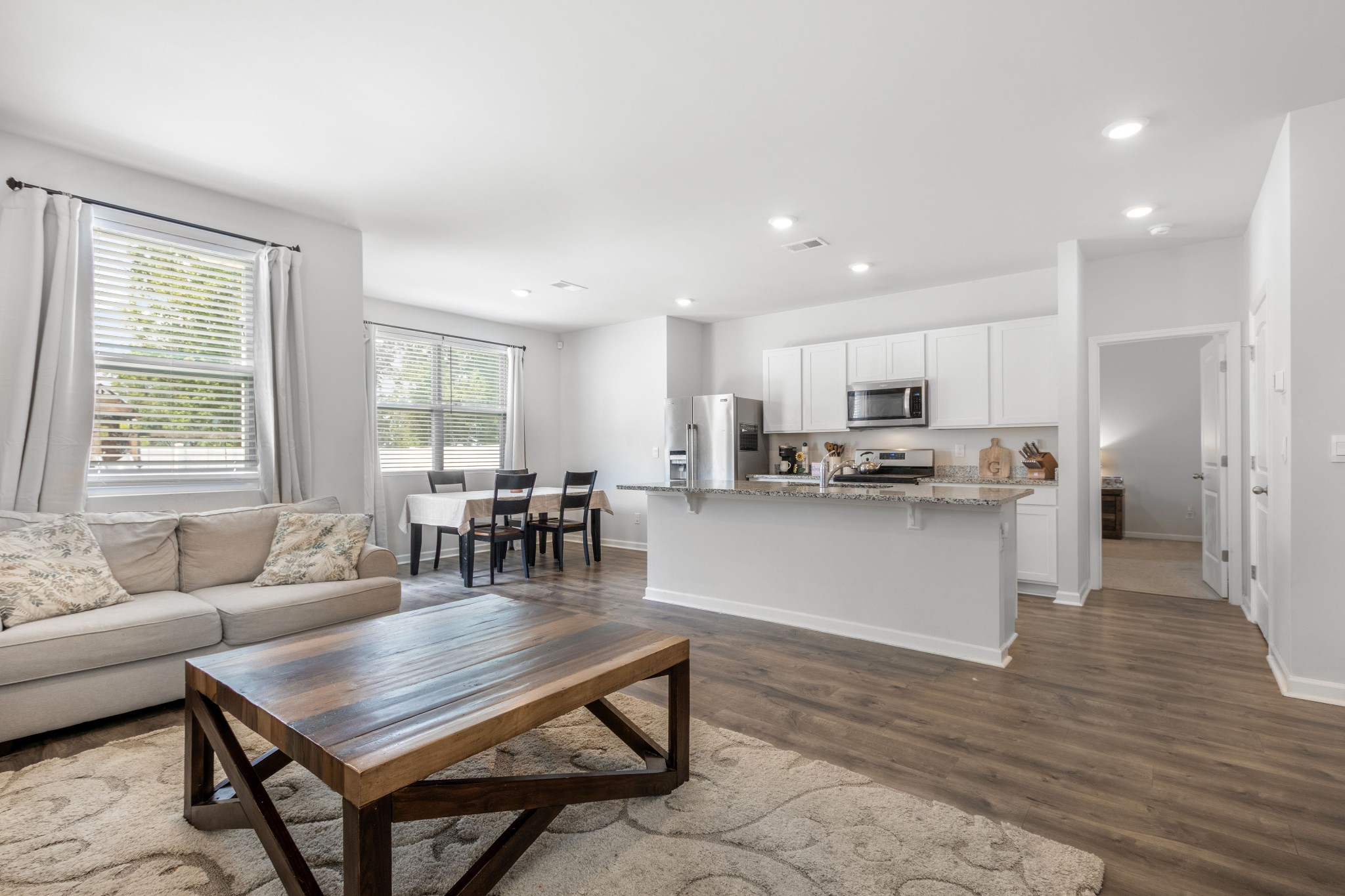 Open living room, kitchen, and dining area